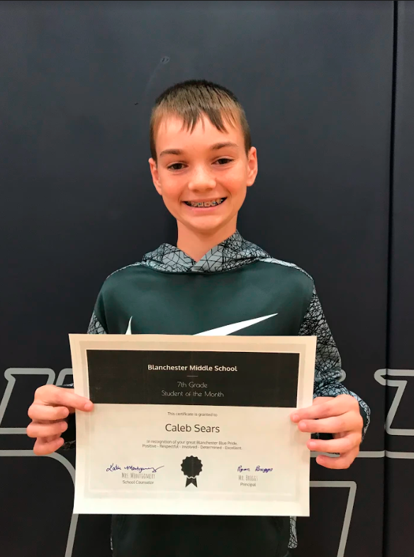 Caleb Sears holding certificate