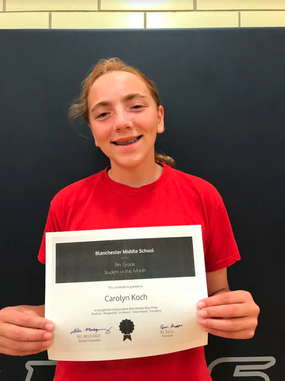 Carolyn Koch holding certificate