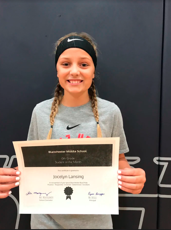 Jocelyn Lansing holding certificate